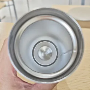 Close-up view of stainless steel vacuum cup interior showing SUS 316 material detail.