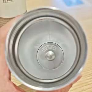 Stainless steel coffee cup interior detail, showcasing 304 material and clean wall.