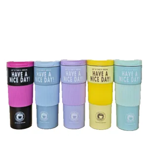 Stainless steel coffee cup with silicone sleeve, vacuum insulated travel mug in multiple colors.