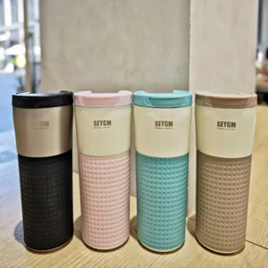 Stainless steel coffee mug set with silicone sleeve, vacuum insulated travel tumbler details.