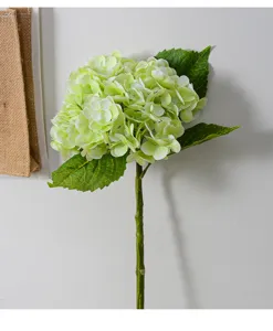 Artificial green hydrangea flower detail shot, ideal for home decor and wedding floral arrangements.