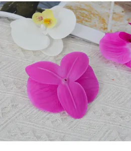 Detailed close-up of artificial orchid flower heads, perfect for DIY crafts and floral design.