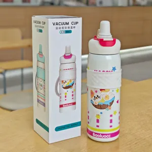 Stainless steel double drink vacuum insulated water bottle with cute cartoon design and box.