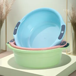 Detailed view of stacked multi-color plastic wash basins with convenient dual handles.