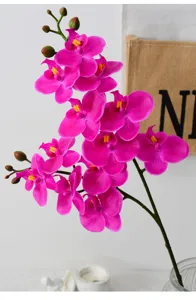 Artificial Phalaenopsis orchid flower stem detail, realistic 3D touch faux orchid for home decor.