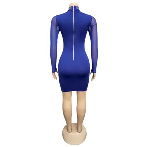 Sexy royal blue mesh rhinestone club dress back view showing long sleeves and metal zipper.