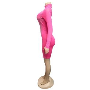 Hot pink rhinestone long sleeve mesh bodycon dress side view showing crystal details.