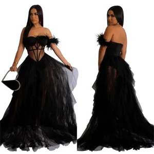 Black strapless mesh maxi dress with corset bodice and feather sleeves for women evening party.