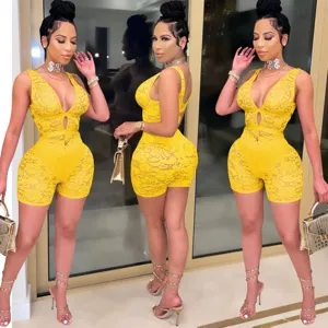 Sexy yellow lace V-neck clubwear romper for women, stylish short jumpsuit for party and night out.