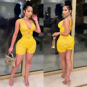 Sexy yellow lace V-neck romper jumpsuit detail view showing intricate floral lace and slim fit.