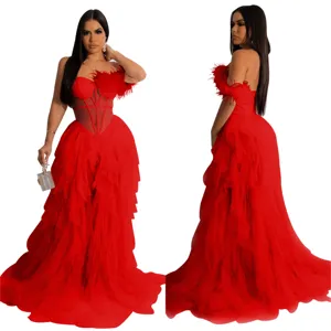 Red strapless mesh long dress detail, featuring feather trim and corset bodice style.
