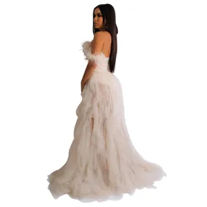 Detail view of the elegant strapless feather mesh long dress, showing back and side design.