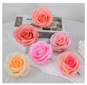 Detailed view of colorful artificial silk rose flower heads, perfect for decoration and DIY.