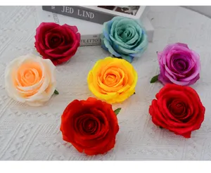 Detailed view of colorful artificial silk rose flower heads for wedding decoration