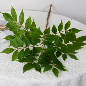 Artificial nandina leaf branch for home decor, realistic green foliage for floral arrangement.