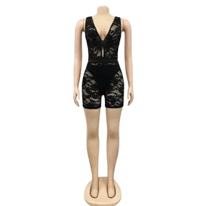 Detailed view of the black lace V-neck sheer romper, featuring exquisite floral patterns.