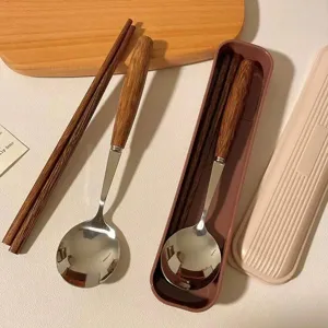 Stainless steel spoon and chopsticks set with wood handle in portable case detail view