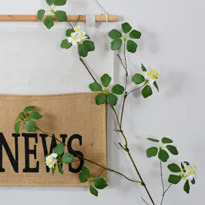 Artificial plant branch vine with white flowers and green leaves for home wall decor main view