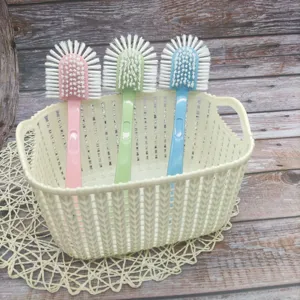 Detailed view of the multi-functional long handle cleaning brush with hard bristles.