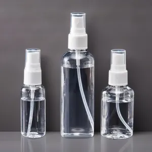 Clear plastic spray bottle detail shot, refillable empty container for cosmetic liquid 85