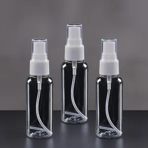 Clear plastic spray bottle set with fine mist pump for cosmetic liquid travel sub-bottling.