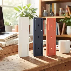 Detail view of punch-free power strip holder wall mount adhesive socket organizer for home office.