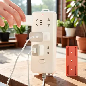 Detail view of the punch-free wall mounted power strip holder and socket fixing organizer.