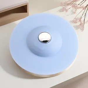 Silicone UFO floor drain core with push button design for kitchen sink and bathroom use.
