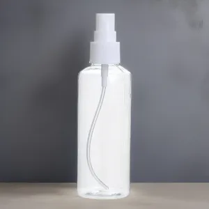 Clear plastic spray bottle for liquid cosmetics, empty fine mist pump bottle dispenser.