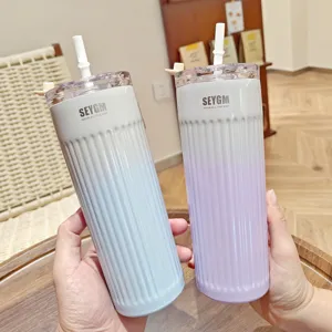 Gradient striped stainless steel tumbler with straw, portable travel coffee cup for daily use.