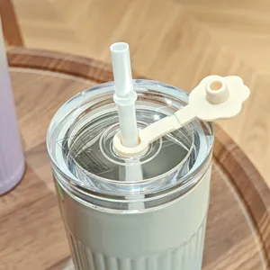 Stainless steel tumbler with straw and cute flower silicone stopper, portable insulated coffee cup.