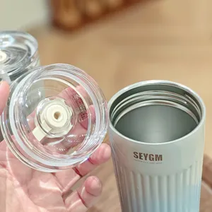 Gradient stainless steel vacuum insulated coffee tumbler detail shot with leak-proof lid.