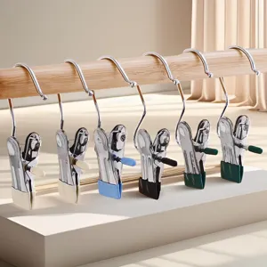Stainless steel laundry clips with non-slip coating, versatile hanging hooks for use.