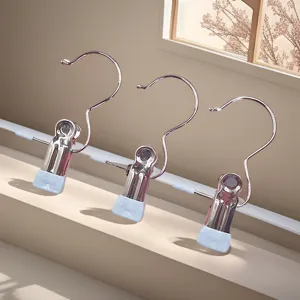 Stainless steel hook clips with protective blue tips, ideal for hanging hats and socks securely.