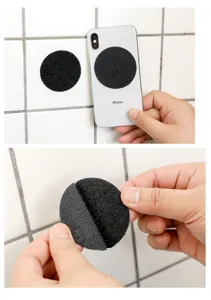 Détail de bande velcro ronde noire, adhésif double face sans trace pour tapis et drap de lit.