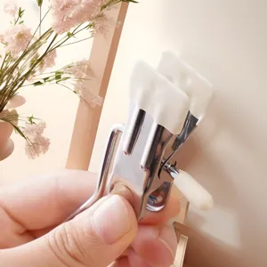 Stainless steel laundry clips with protective rubber tips for drying socks, hats, and clothes.
