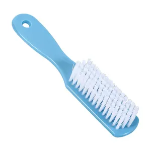 Cepillo de limpieza de plástico azul con cerdas duras blancas para zapatos y ropa.