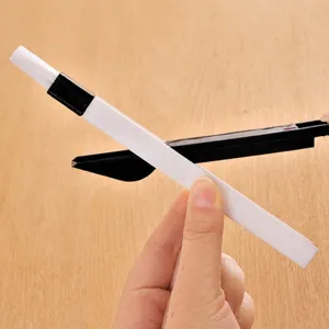 Multi-purpose window groove cleaning brush keyboard dust removal tool with scraper.