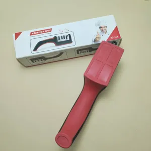 Detail view of the 4-stage kitchen knife sharpener in red and black with retail packaging.