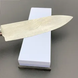 Professional double-sided whetstone sharpening stone set with kitchen knife for daily home use.