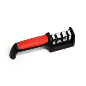 Close-up view of the 4-stage manual knife sharpener showing precision sharpening slots and handle.