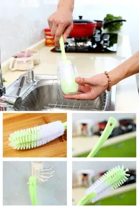 Long handle cleaning brush detail, close-up of bristles and handle for daily kitchen cleaning.