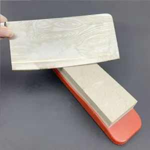Professional double-sided whetstone sharpening stone set with non-slip base for kitchen knives.