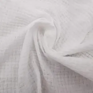 White compressed towel detail texture closeup, soft fabric breathable hygiene material view