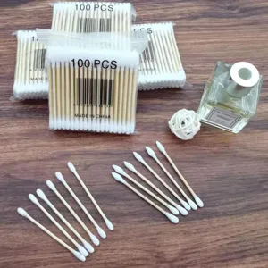 Packung mit 100 doppelendigen Wattestäbchen mit Holzstäbchen für Make-up und Pflege.