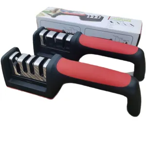 Manual kitchen knife sharpener with 4-stage grinding slots and ergonomic red black handle.
