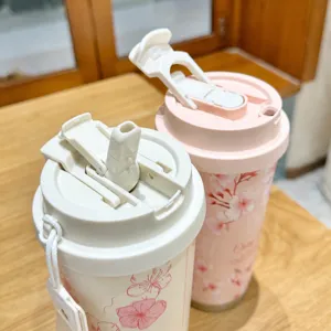 Double drink vacuum thermos cup with straw and direct drinking lid, cute floral pattern.