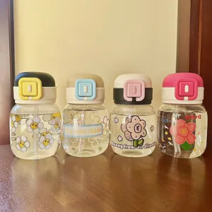 Cute glass water bottle with straw and flower pattern, plump portable sippy cup for girls.