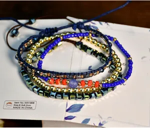 Boho multi-layer beaded bracelet set with blue miyuki beads, gemstone and crystals.