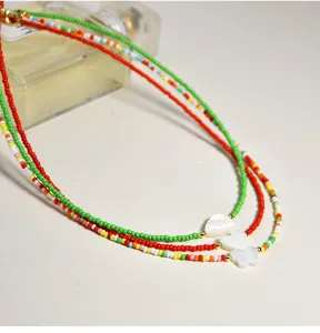 Colorful seed bead layered necklace with cute shell heart and butterfly pendants for women.